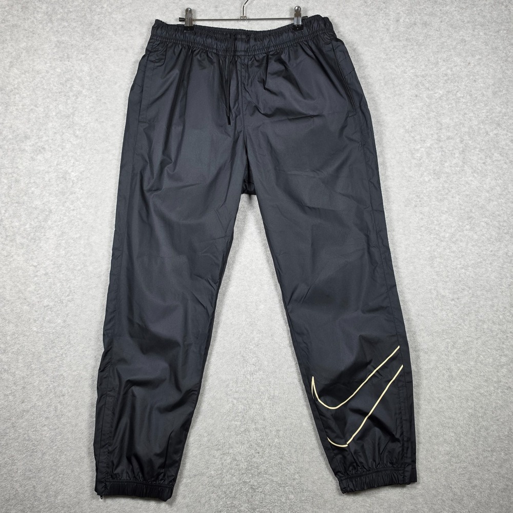 Nike SB Track Pants Mens Size Medium Black Swoosh Windbreaker Ankle Zip NEW